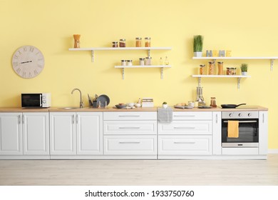 Interior Of Modern Kitchen With Shelves