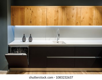 Interior of modern kitchen with white counter