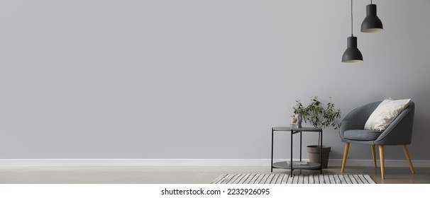 Interior of modern living room with armchair and table. Banner for design - Shutterstock ID 2232926095