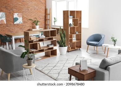 Interior Of Modern Living Room With Stylish Wooden Bookshelves