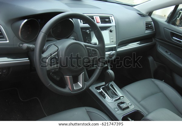 Interior of a modern luxury brand car, black
leather and metal