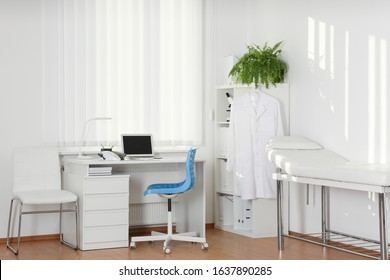 Interior of modern medical office with doctor's workplace