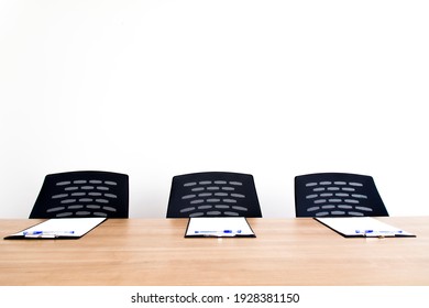 Interior Of Modern Meeting Room With Table And Chair. Mediation Room. White Paper With Pen In Meeting Room.