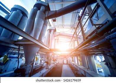 Interior Of Modern Natural Oil Factory. The Piping, Pumps And Motors. Industry Background