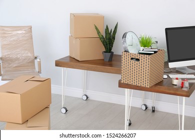 Interior Of Modern Office With Packed Belongings. Moving Service