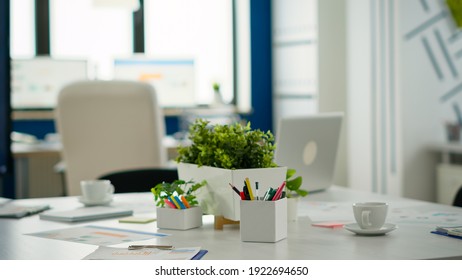 Interior Of Modern Open Plan Financial Office With No People, Stylish Room Interior With Meeting Table And Chairs. Business Center With Brainstorm Area, Shot Of Empty Room With Modern Furniture.