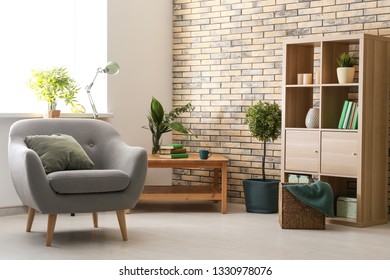 Interior of modern room with comfortable armchair - Shutterstock ID 1330978076