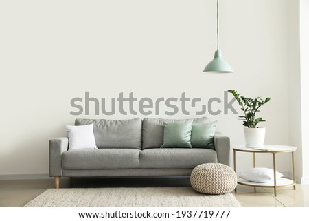 Interior of modern room with comfortable sofa Foto stock © 