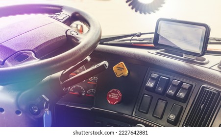 Interior of modern semi truck interior cabin with electronic log boog screen on dashboard. Trucking business with details of dashboard . Hours of Service compliance  - Shutterstock ID 2227642881