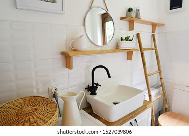 Interior Of Modern Small Bathroom With Wooden Decor And White Color In Vintage Style. Small Bathroom In Cottage.