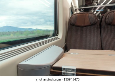 Interior Of Modern Train With Seat And Window