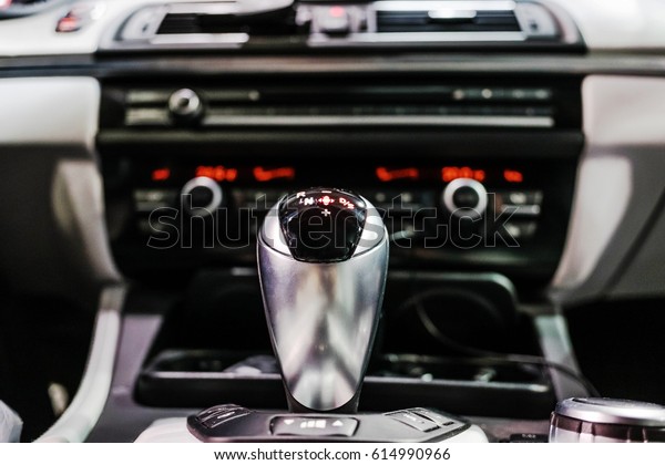 interior of a
modern vehicle. shot was taken from center console to shoe the
shift knob and various control buttons
