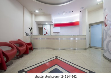 Interior of a modern waiting room with reception desk - reception area 