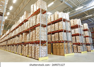 interior of modern warehouse. Rows of shelves with boxes