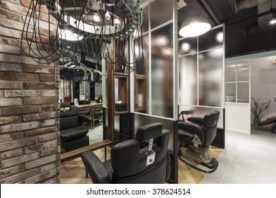 The Interior Of Modern(organic, Vintage, Natural) Hair Salon(beauty Parlor, Hairdresser's) With Chair, Red Brick, Marble Bottom