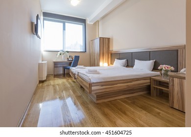 Interior of a new double bed hotel bedroom