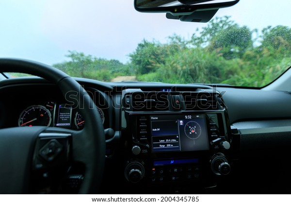 Interior of off road
car in the rainy
nature