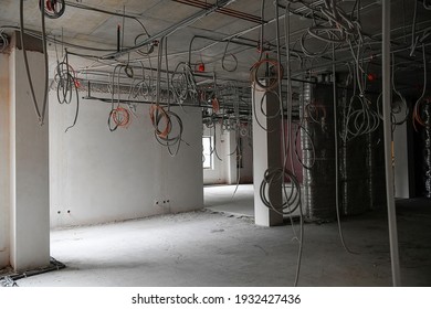 Interior Of Office Or Industrial Premises Under Construction. Placement Of Electrical Wires And Cables. 