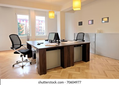 Interior Of An Office With Two Chairs