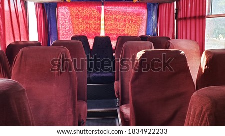 Interior of an old bus for transporting passengers.
