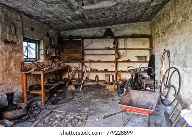 Interior Of An Old Dirty Garage Full Of Stuff.