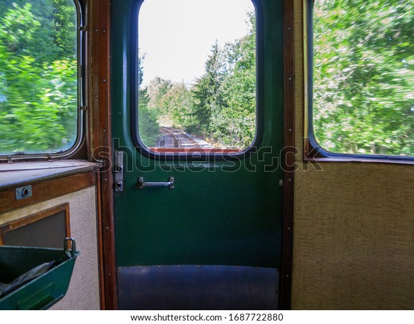 Interior of an old railway\
car in speed