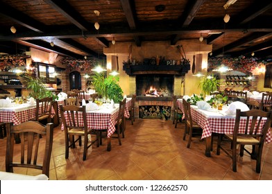 Interior Of An Old Tavern With Old Wooden Furniture.