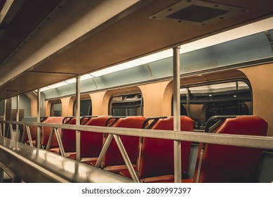 Interior perspective showing the view from inside a distinctive Gallery Car on a Metra commuter train while traveling through the Chicago area.