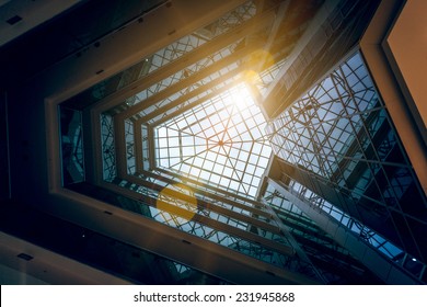 Interior Photo Of Modern Building Atrium With Shining Sun