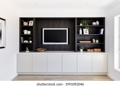 Interior Photography Of Built In Cupboards And Shelving In A Lounge Room