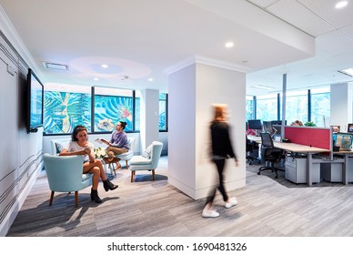 Interior Photography Of A Casual Meeting Areas In A Modern Corporate Office, Staff Members In Their Work Environment In An Open Plan Office