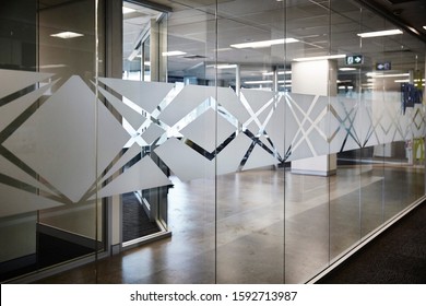 Interior Photography Of Commercial Fit Out Of Corporate Office, Glass With Decal On Outside Of Reception Area Looking In