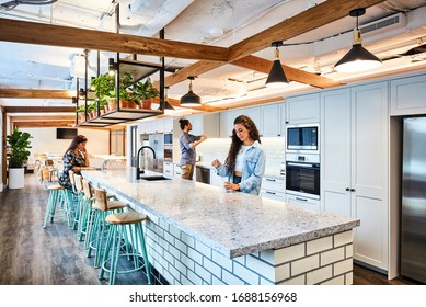 Interior Photography Of A Contemporary Design Corporate Office Break Out Area, Staff In A Kitchen Area