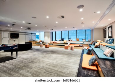 Interior Photography Of A Contemporary Design Corporate Office Break Out Area With A Pool Table And Lounge