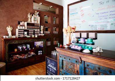 Interior Photography Of A Day Spa/massage Clinic With Retail Stock And Treatment Menu Boards