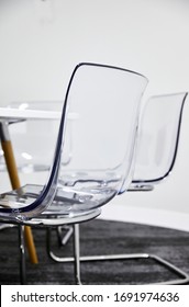 Interior Photography Detail Of A Clear Plastic Moulded Chair In A Meeting Room In A Corporate Office