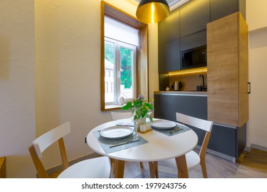 Interior Photography, Loft Style, Small Apartment With Warm Light And Dark Kitchen