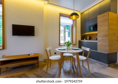 Interior Photography, Loft Style, Small Apartment With Warm Light And Dark Kitchen