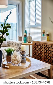 Interior Photography Of Modern Coastal Hamptons Style Open Plan Lounge Room, Details Of Timber Sideboard, Coffee Table, Decorative Objects, Floral Arrangements And Candles