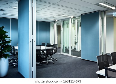 Interior Photography Of A Modern Corporate Board Room With Moveable Walls, A Second Board Room To The Right