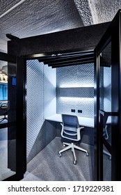 Interior Photography Of A Padded Interior Of A Sound Proof Booth In A Corporate Office