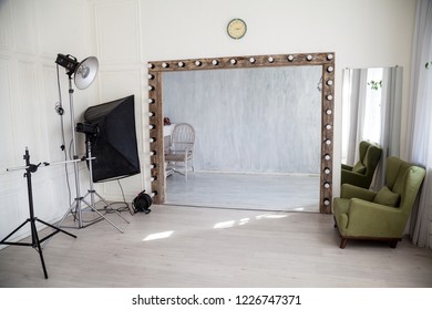 Interior of PhotoStudio flash light wall Chair - Powered by Shutterstock