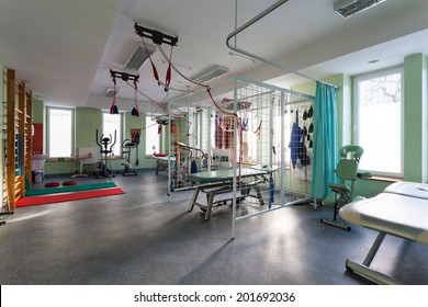 Interior Of Physiotherapy Clinic With Equipment For Rehabilitation