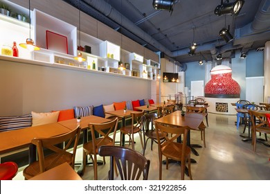 Interior Of A Pizza Restaurant With Wood Fired Oven