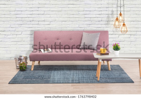 Interior of Purple sofa\
bed and blue rug