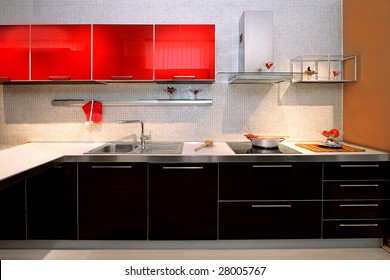 Interior Of Red Kitchen With Contemporary Counter