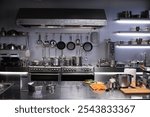 Interior of restaurant kitchen with professional utensils, out of focus