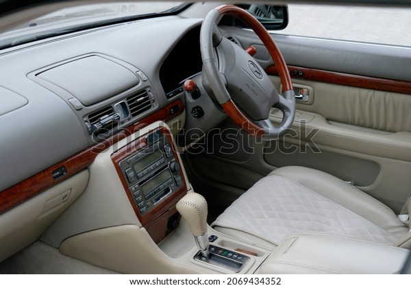The interior of a\
right-hand drive car at the exhibition of retro cars in Arkhangelsk\
on October 9, 2021