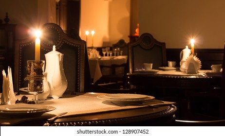 Interior At A Romantic Restaurant With Candles