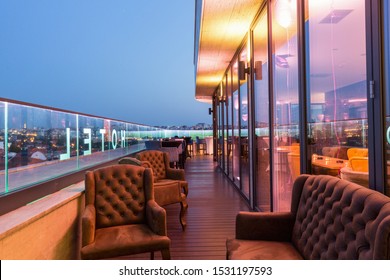 Interior of a rooftop hotel bar restaurant terrace